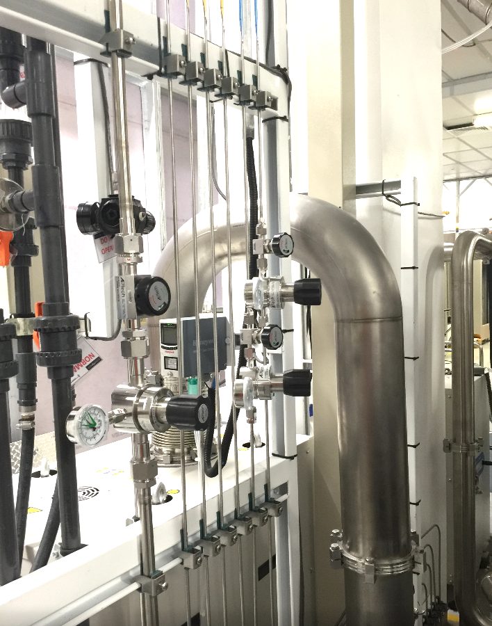 Stainless gas-stick piping installed in a semiconductor cleanroom
