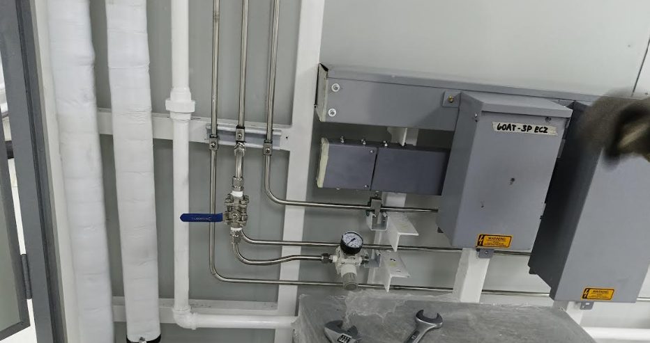 Cleanroom gas-supply piping routed through a semiconductor cleanroom